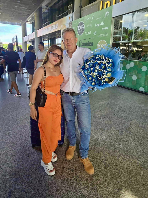Happy customer with flowers