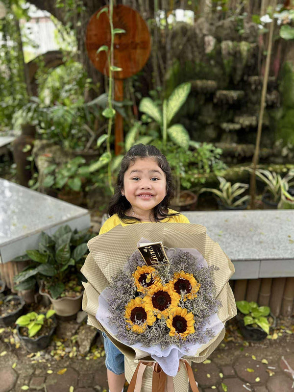 Happy customer with flowers